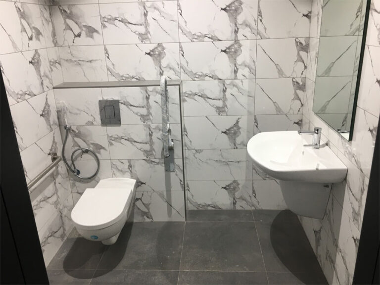 Finished washroom with marble tiling