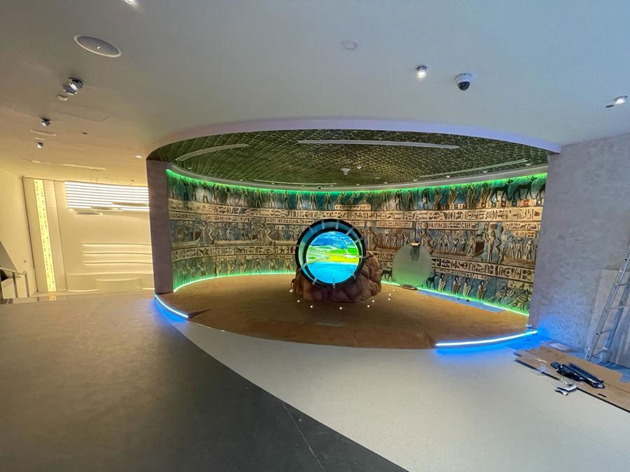 Finished interior exhibit hall with themed lighting
